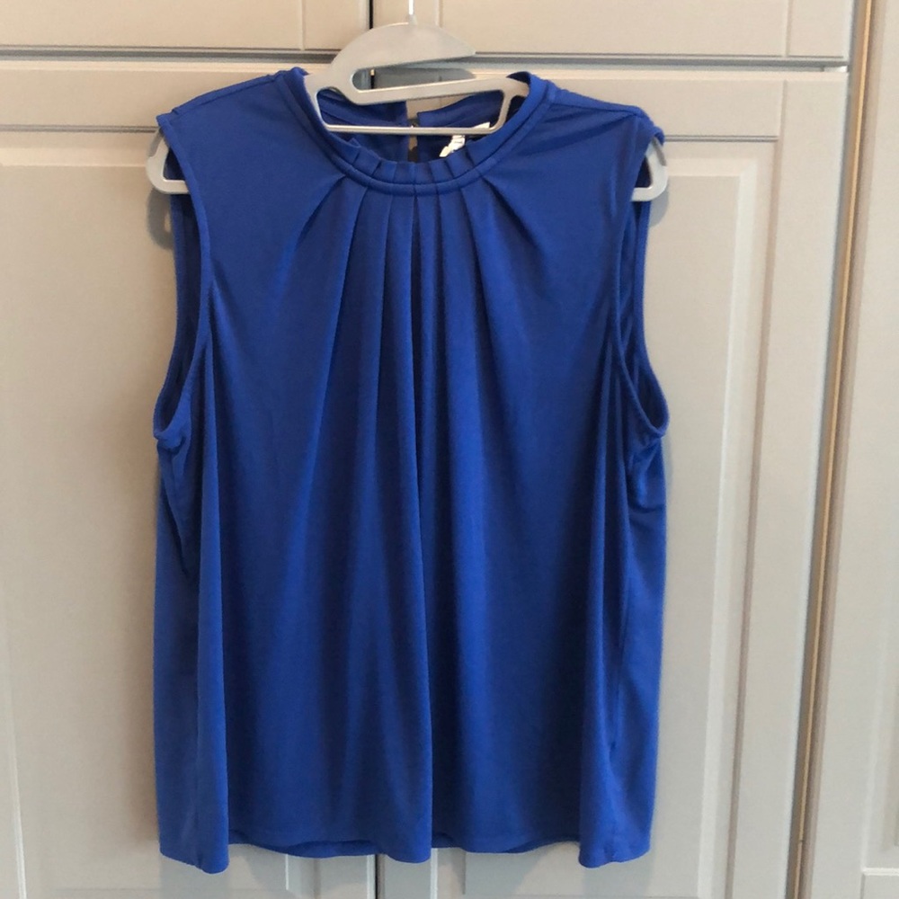 Blue sleeveless high neck blouse